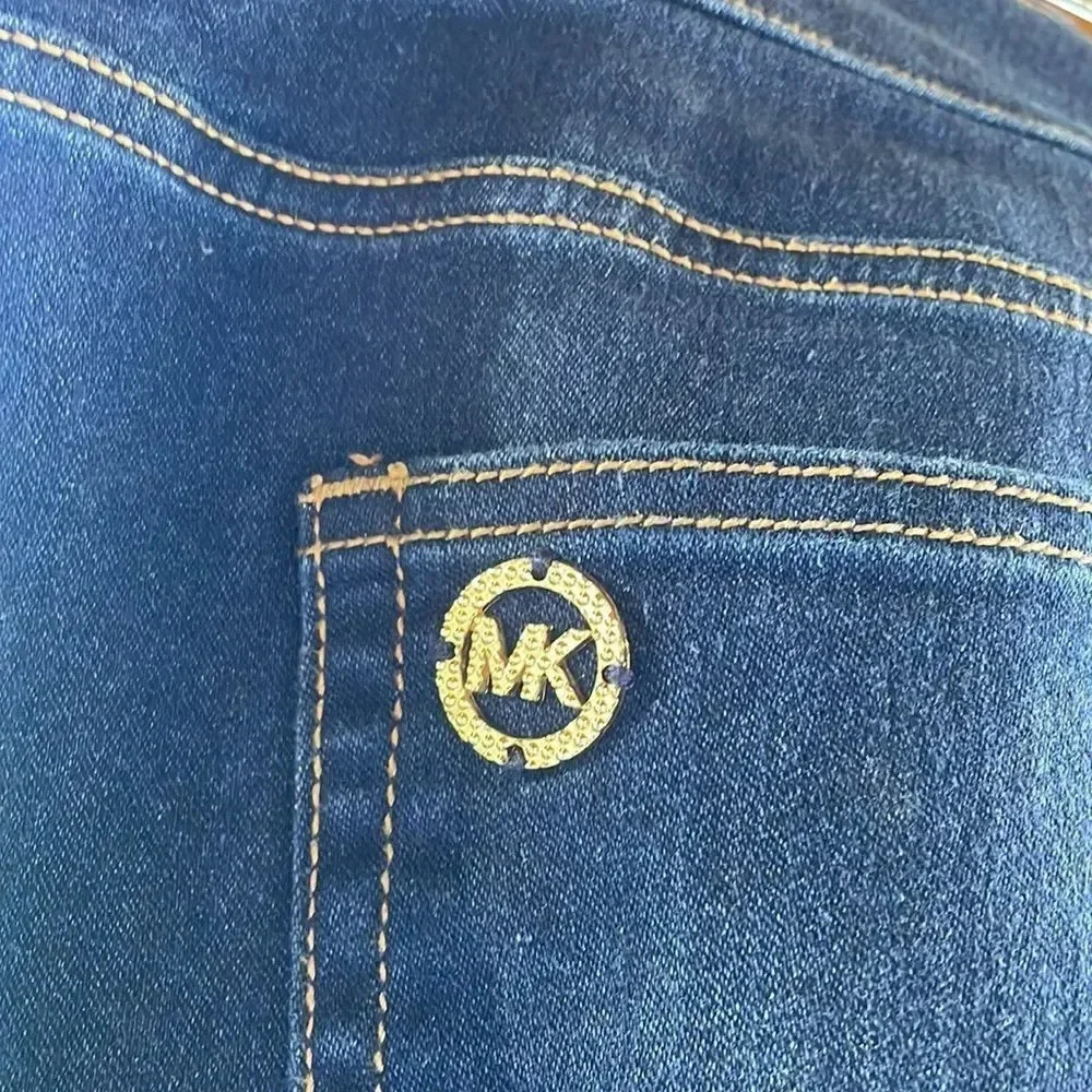 Michael Kors woman’s dark blue jeans. They are a size 10
